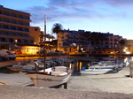 FZ026601 Boats in Es Canar harbour at dusk.jpg